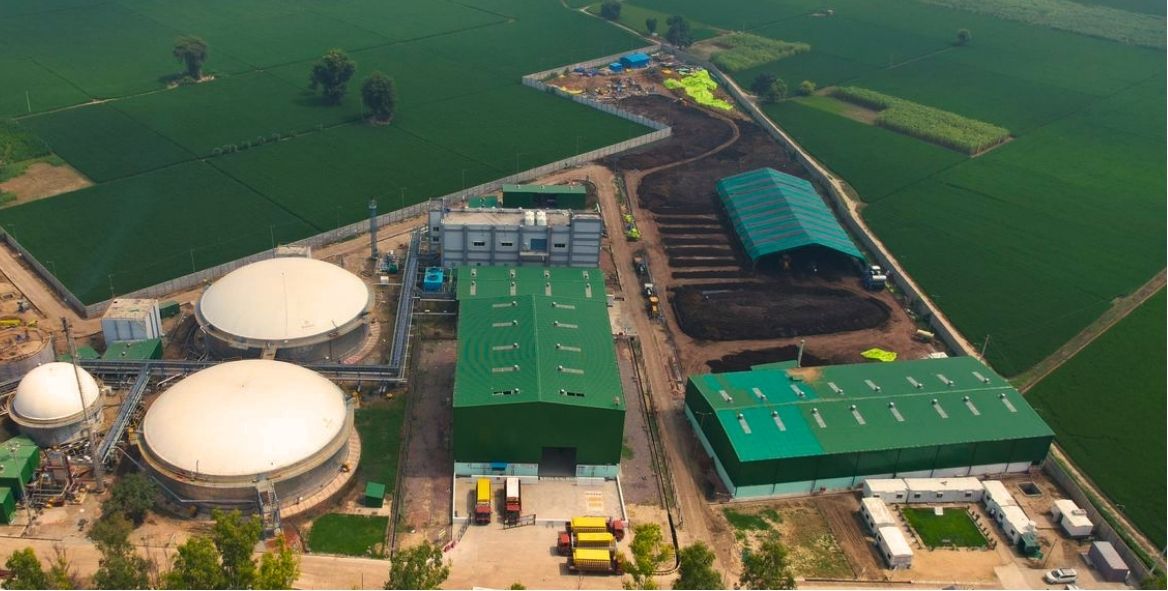 Aerial landscape view of biogas plant site — environmental section